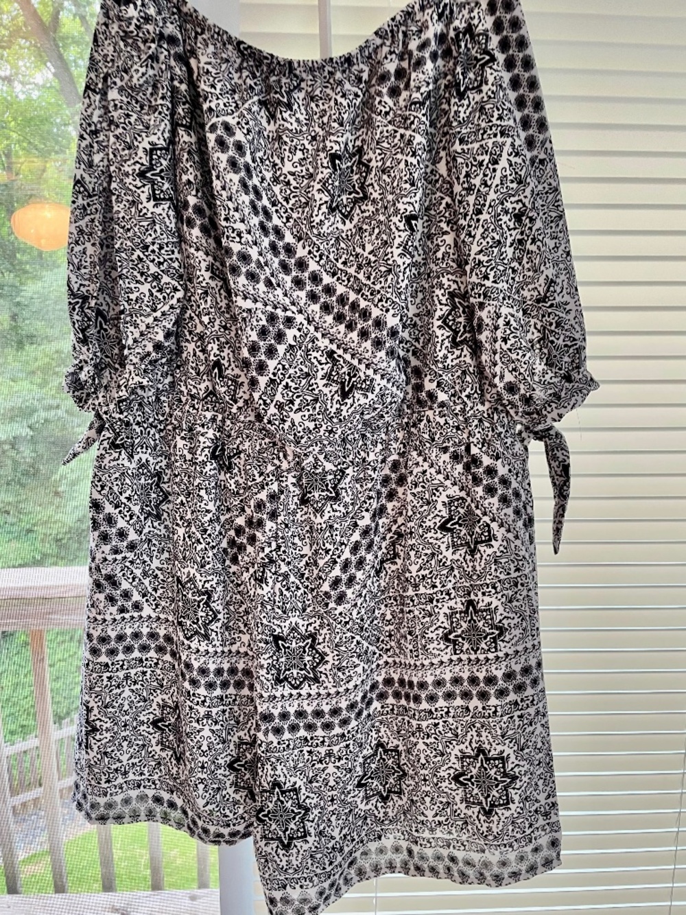 Adorable off the shoulder romper. Black & white. Light weight.